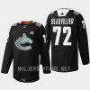 men canucks anthony beauvillier heritage warm up black history month 2023 black jersey