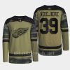 men red wings alex nedeljkovic 2022 warmup veterans day camo jersey